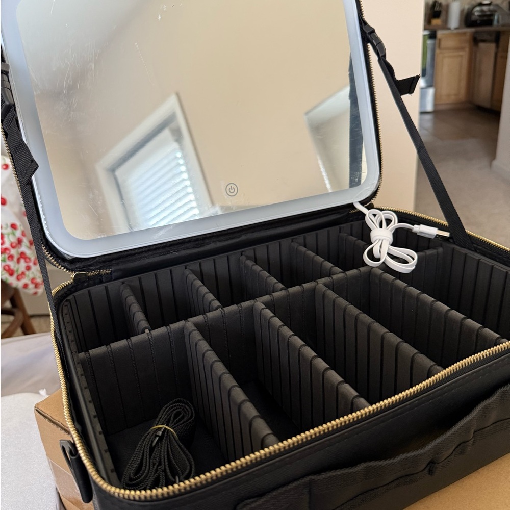 Black Makeup Organizer with Multiple Compartments and Portable Design